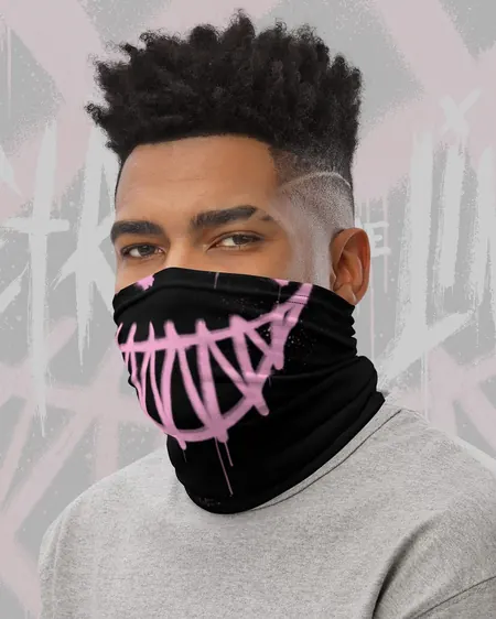 Black bandana printed with the pink sprayed grin, worn as a face mask