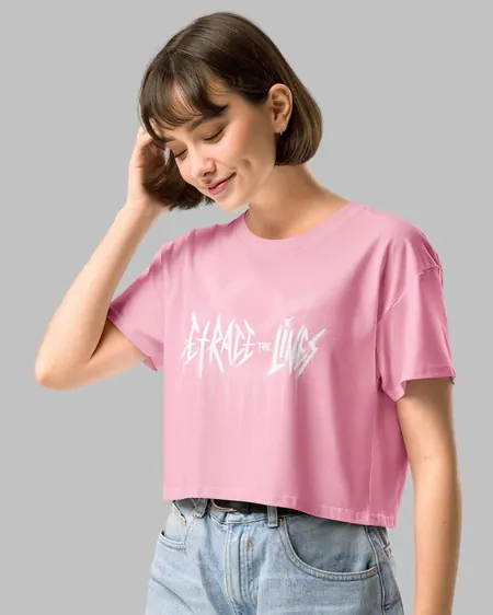 Pink crop top with the Retrace The Lines handstyle logo in white