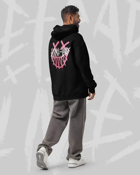 Black hoodie with the pink smiley and Retrace The Lines print on the back
